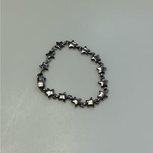 Authentic Tiffany’s star bracelet.